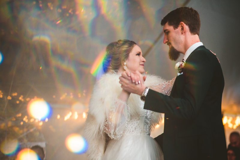 A backyard wedding with dinosaurs, DIY, & a gorgeous gown made by the bride