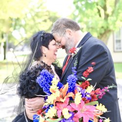 This bride bought her black dress 30 year ago and finally got to wear it at her spooktacular wedding