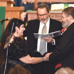 This bride bought her black dress 30 year ago and finally got to wear it at her spooktacular wedding