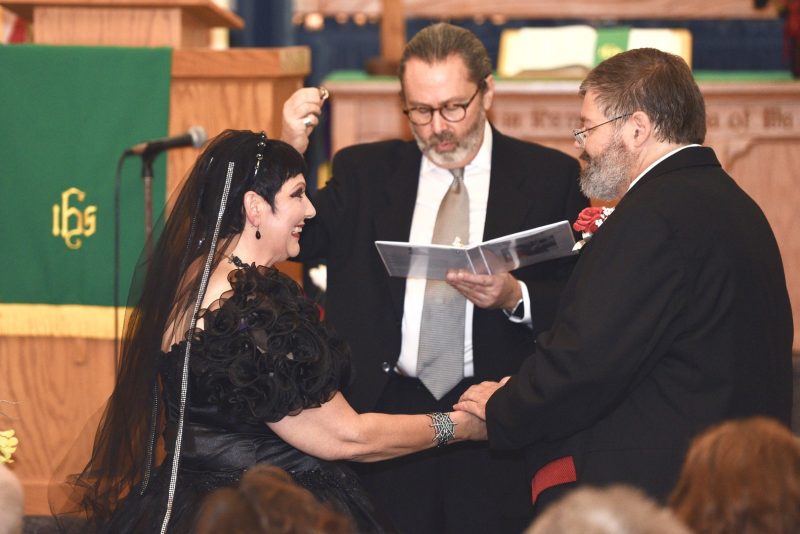 This bride bought her black dress 30 year ago and finally got to wear it at her spooktacular wedding