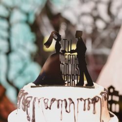 This bride bought her black dress 30 year ago and finally got to wear it at her spooktacular wedding