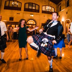 Natalie Jonathan Wedding 341 - Sword fights & purple kilts at this dance party wedding with an Oreo toast Sword fights & purple kilts at this dance party wedding with an Oreo toast
