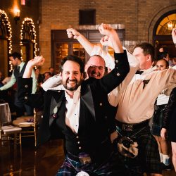 Natalie Jonathan Wedding 386 - Sword fights & purple kilts at this dance party wedding with an Oreo toast Sword fights & purple kilts at this dance party wedding with an Oreo toast
