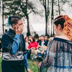 Spot the pups, swords, & EPIC cape at this fantasy themed wedding