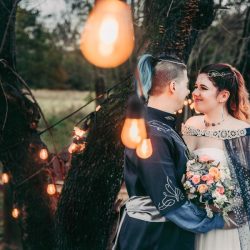 Spot the pups, swords, & EPIC cape at this fantasy themed wedding