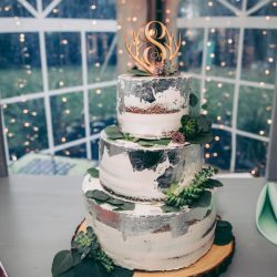 Spot the pups, swords, & EPIC cape at this fantasy themed wedding