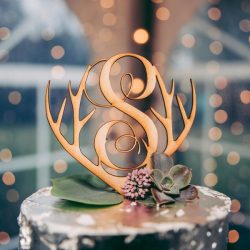 Spot the pups, swords, & EPIC cape at this fantasy themed wedding