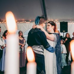 Spot the pups, swords, & EPIC cape at this fantasy themed wedding