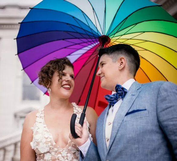 This intimate, queer state capitol wedding brought the perfect amount of rainbow magic