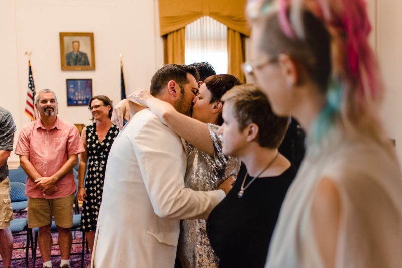 This urban swinger-vibe microwedding had '60s style, beer, & lots of makeouts