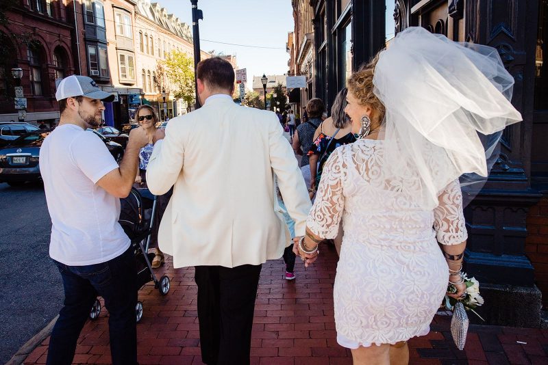 This urban swinger-vibe microwedding had '60s style, beer, & lots of makeouts