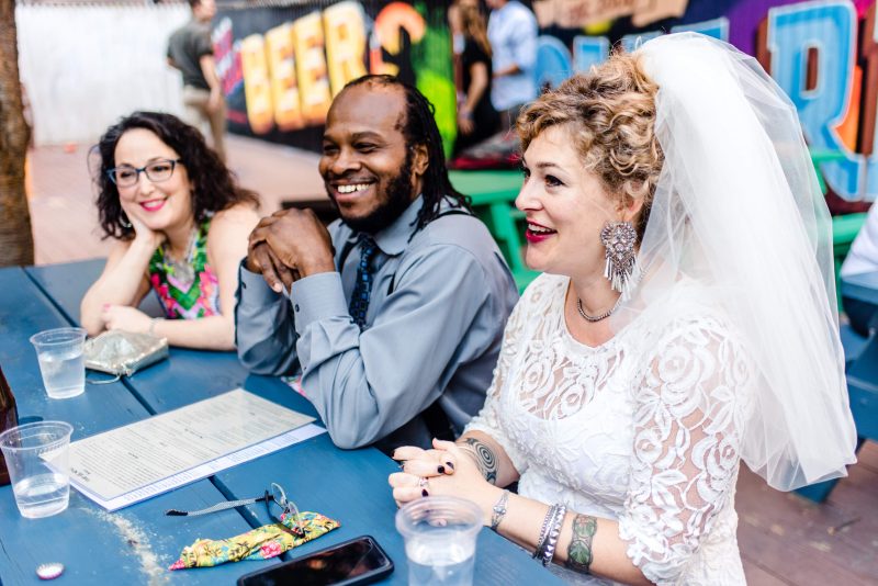 This urban swinger-vibe microwedding had '60s style, beer, & lots of makeouts