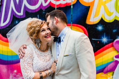 This urban swinger-vibe microwedding had '60s style, beer, & lots of makeouts
