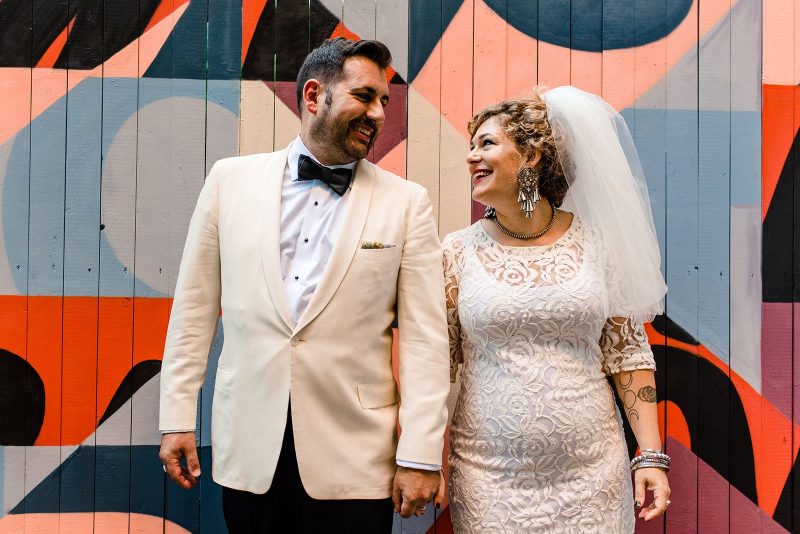 This urban swinger-vibe microwedding had '60s style, beer, & lots of makeouts