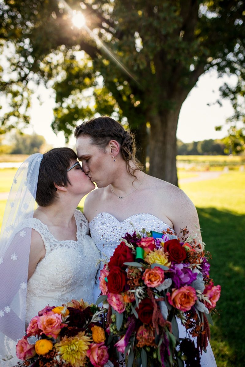 DutcherPhotography Sarah Mabel 1017 - Rainbows & dinos at this magical queer wedding in Madison, WI Rainbows & dinos at this magical queer wedding in Madison, WI