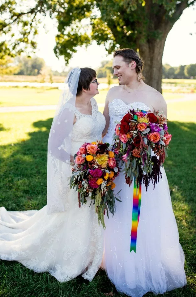 Rainbows & dinos at this magical queer wedding in Madison, WI