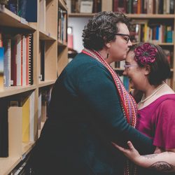 High Resolution 0036 - Love in the stacks: a literary engagement shoot with two cute brides-to-be High Resolution 0036