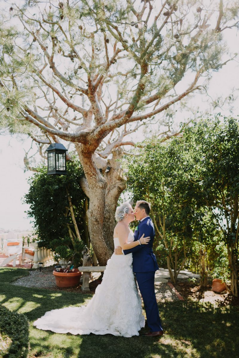 Churros, quiet moments, & a spiral aisle at this sunlit wedding in La Jolla