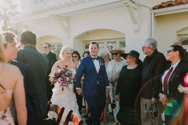 Churros, quiet moments, & a spiral aisle at this sunlit wedding in La Jolla