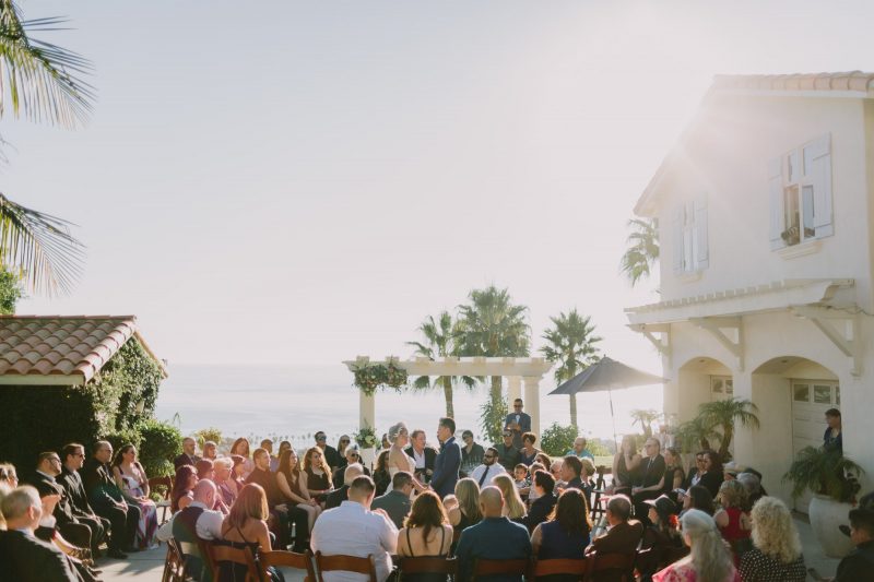 Churros, quiet moments, & a spiral aisle at this sunlit wedding in La Jolla