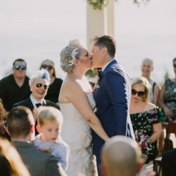 Churros, quiet moments, & a spiral aisle at this sunlit wedding in La Jolla