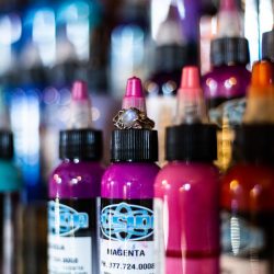 Ink, roses, & tequila shots at this goth meets spring wedding at Lafitte Street Market