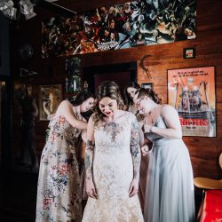 Ink, roses, & tequila shots at this goth meets spring wedding at Lafitte Street Market