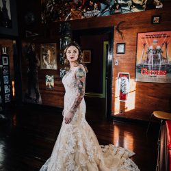 Ink, roses, & tequila shots at this goth meets spring wedding at Lafitte Street Market