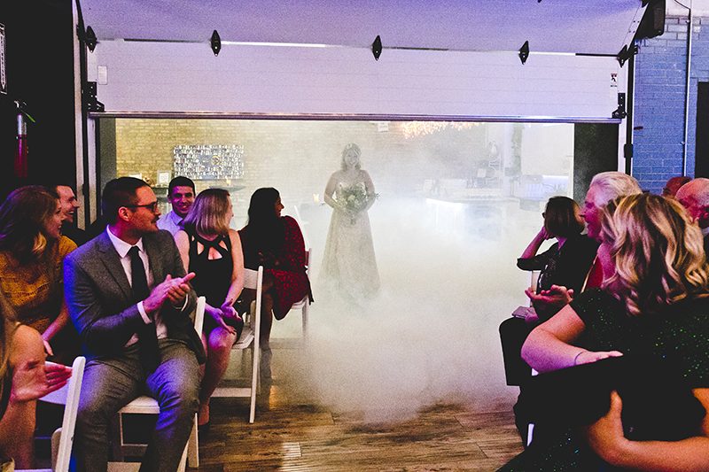 Mario Kart, an open mic, and an aisle walk through a fog machine(!) at this creative Chicago wedding