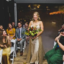 Mario Kart, an open mic, and an aisle walk through a fog machine(!) at this creative Chicago wedding