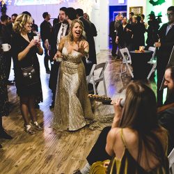 Mario Kart, an open mic, and an aisle walk through a fog machine(!) at this creative Chicago wedding
