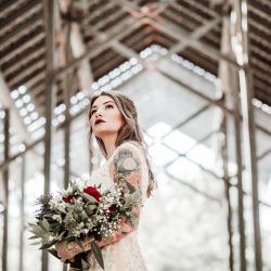 Ink, roses, & tequila shots at this goth meets spring wedding at Lafitte Street Market