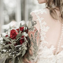 Ink, roses, & tequila shots at this goth meets spring wedding at Lafitte Street Market
