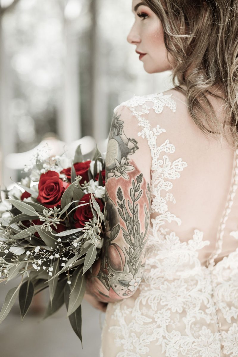 Ink, roses, & tequila shots at this goth meets spring wedding at Lafitte Street Market
