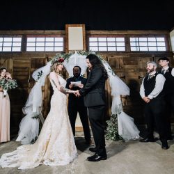 Ink, roses, & tequila shots at this goth meets spring wedding at Lafitte Street Market