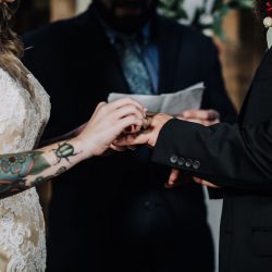 Ink, roses, & tequila shots at this goth meets spring wedding at Lafitte Street Market