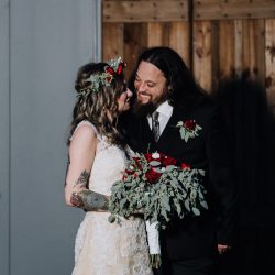 Ink, roses, & tequila shots at this goth meets spring wedding at Lafitte Street Market