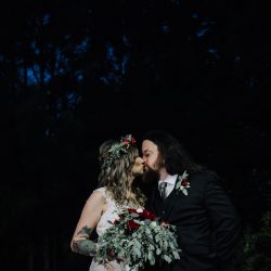 Ink, roses, & tequila shots at this goth meets spring wedding at Lafitte Street Market