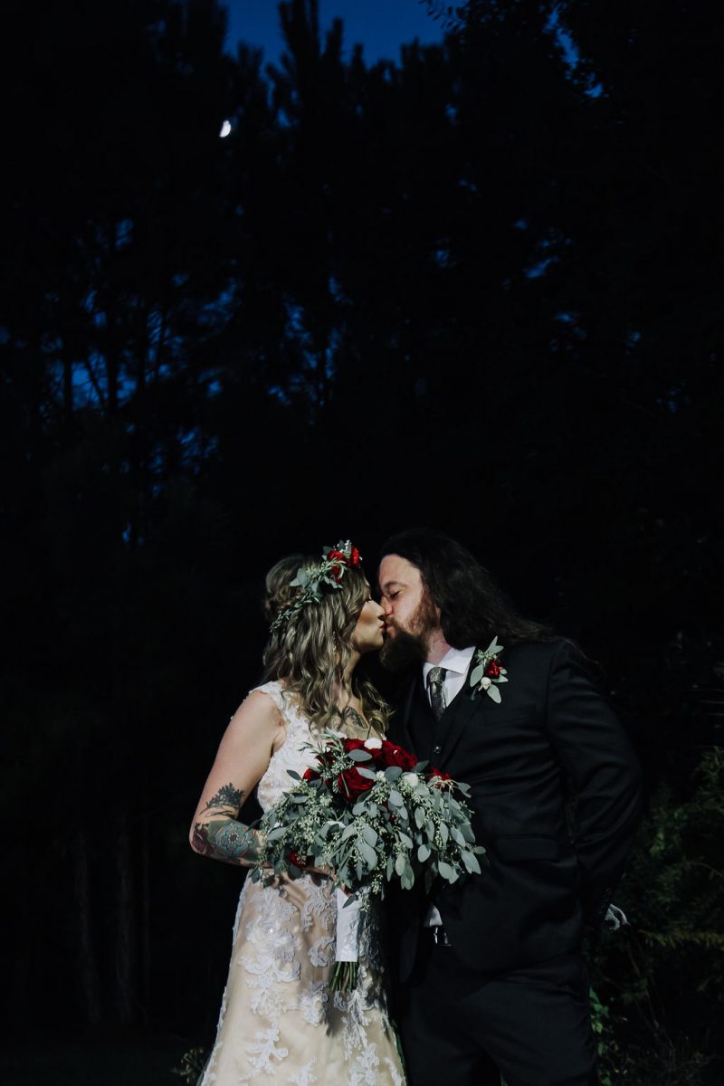 Ink, roses, & tequila shots at this goth meets spring wedding at Lafitte Street Market
