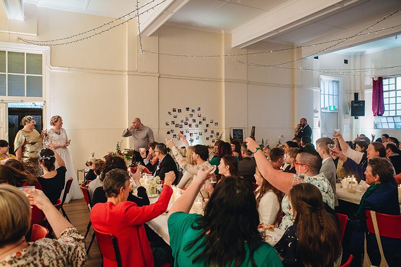 After 14 years of waiting, these Australian ladies finally had the warm, sparkly, relaxed potluck wedding of their dreams