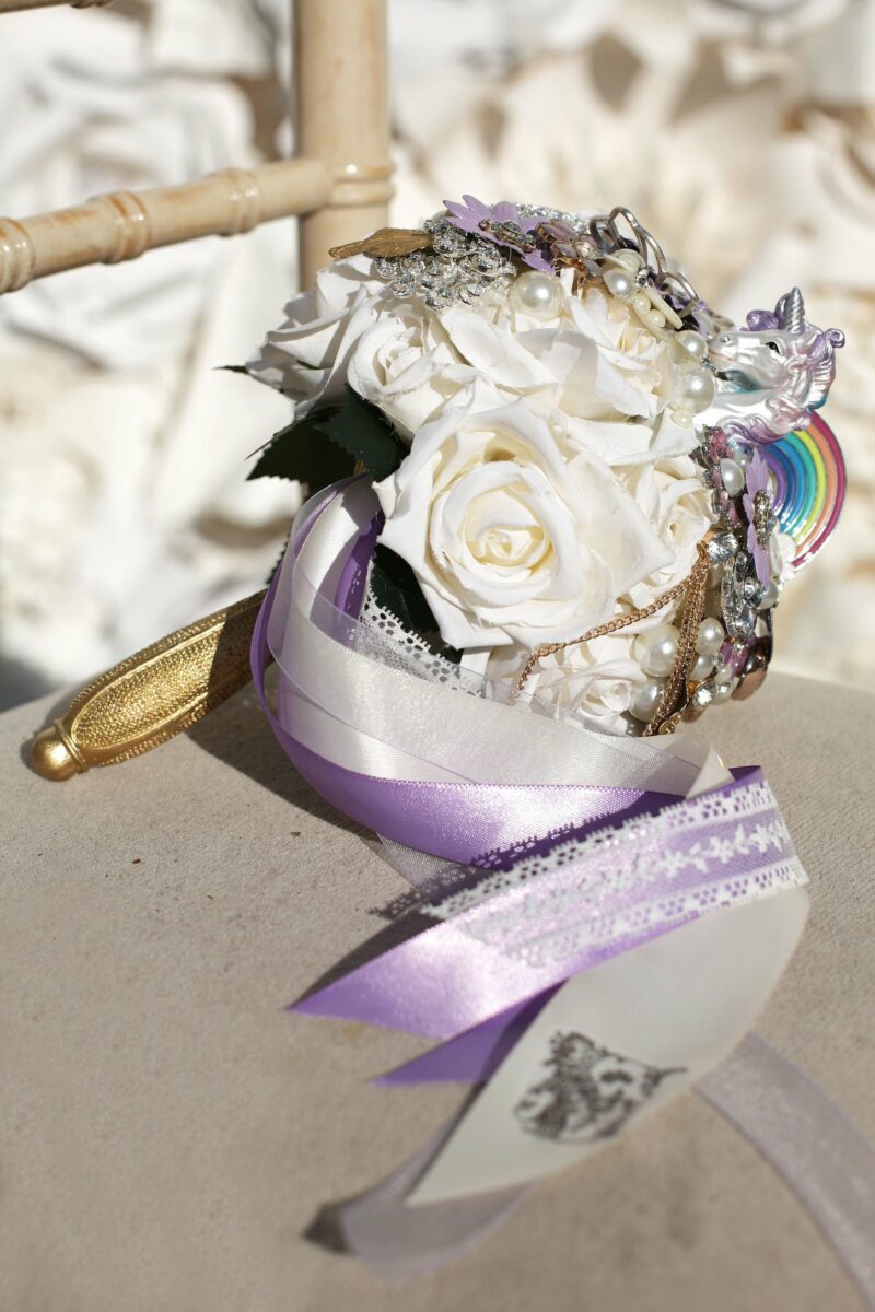 rainbow wedding details unicorn bouquet on offbeat bride