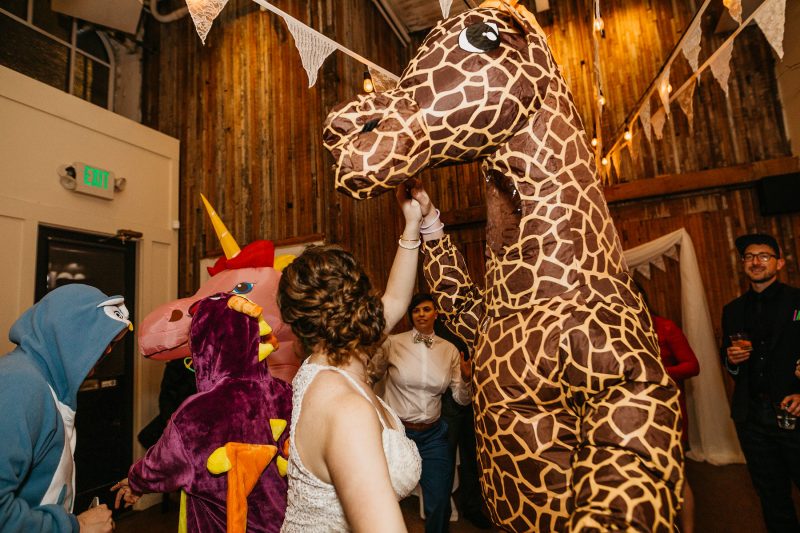 Don your wings & feathers for this whimsical animal menagerie wedding (with a unicorn first look!)