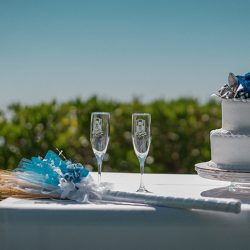 A romantic O'ahu wedding with two grooms, a beachside ceremony, & jumping the "groomstick"