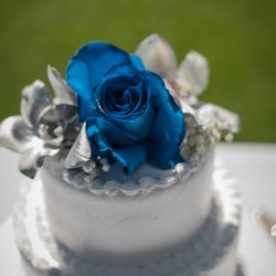 A romantic O'ahu wedding with two grooms, a beachside ceremony, & jumping the "groomstick"