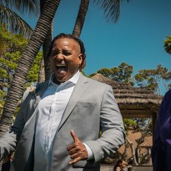 A romantic O'ahu wedding with two grooms, a beachside ceremony, & jumping the "groomstick"