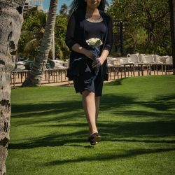 A romantic O'ahu wedding with two grooms, a beachside ceremony, & jumping the "groomstick"