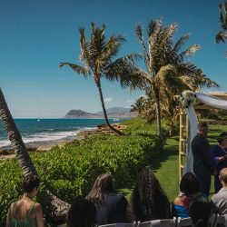 A romantic O'ahu wedding with two grooms, a beachside ceremony, & jumping the "groomstick"
