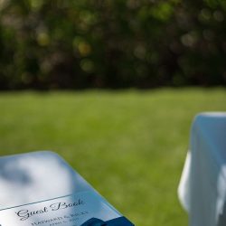 A romantic O'ahu wedding with two grooms, a beachside ceremony, & jumping the "groomstick"