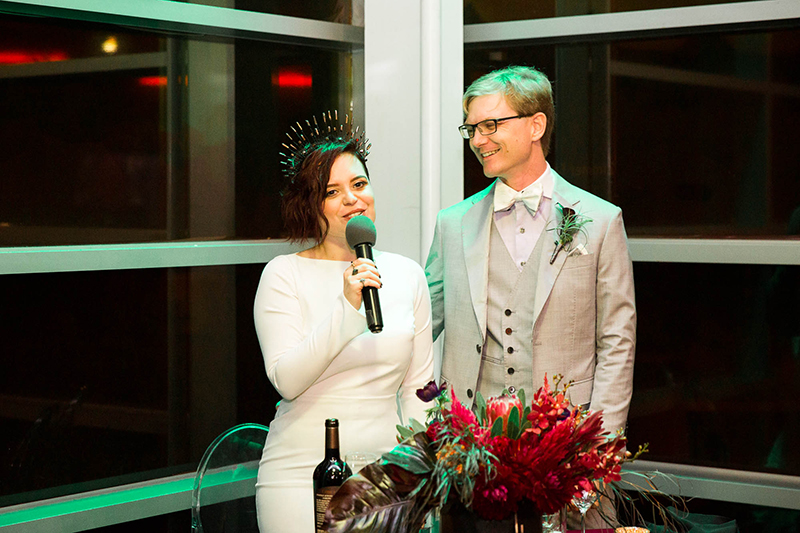 Crowns, pink flowers, & the cosmos at this Space Center wedding