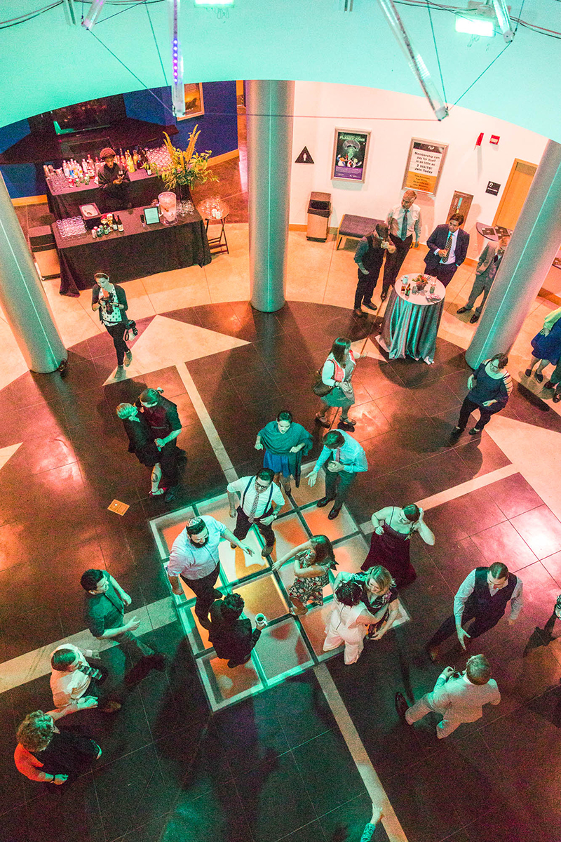 Crowns, pink flowers, & the cosmos at this Chabot Space Center wedding